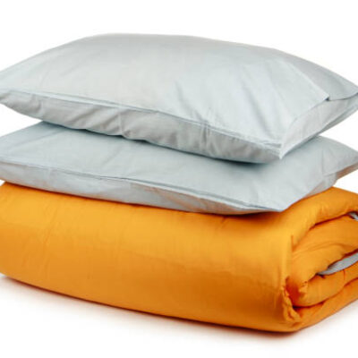 Linen with pillows and blanket isolated