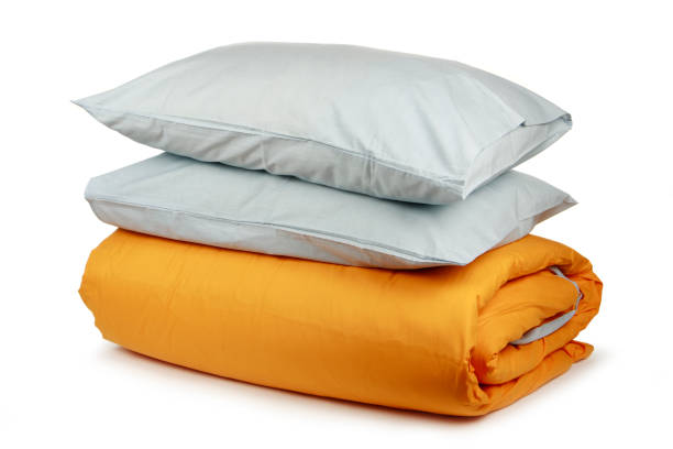 Linen with pillows and blanket isolated