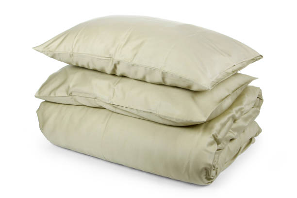 Linen with pillows and blanket isolated