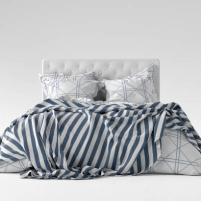 Bed with duvet, bedding and pillows isolated on white. front view. 3d render